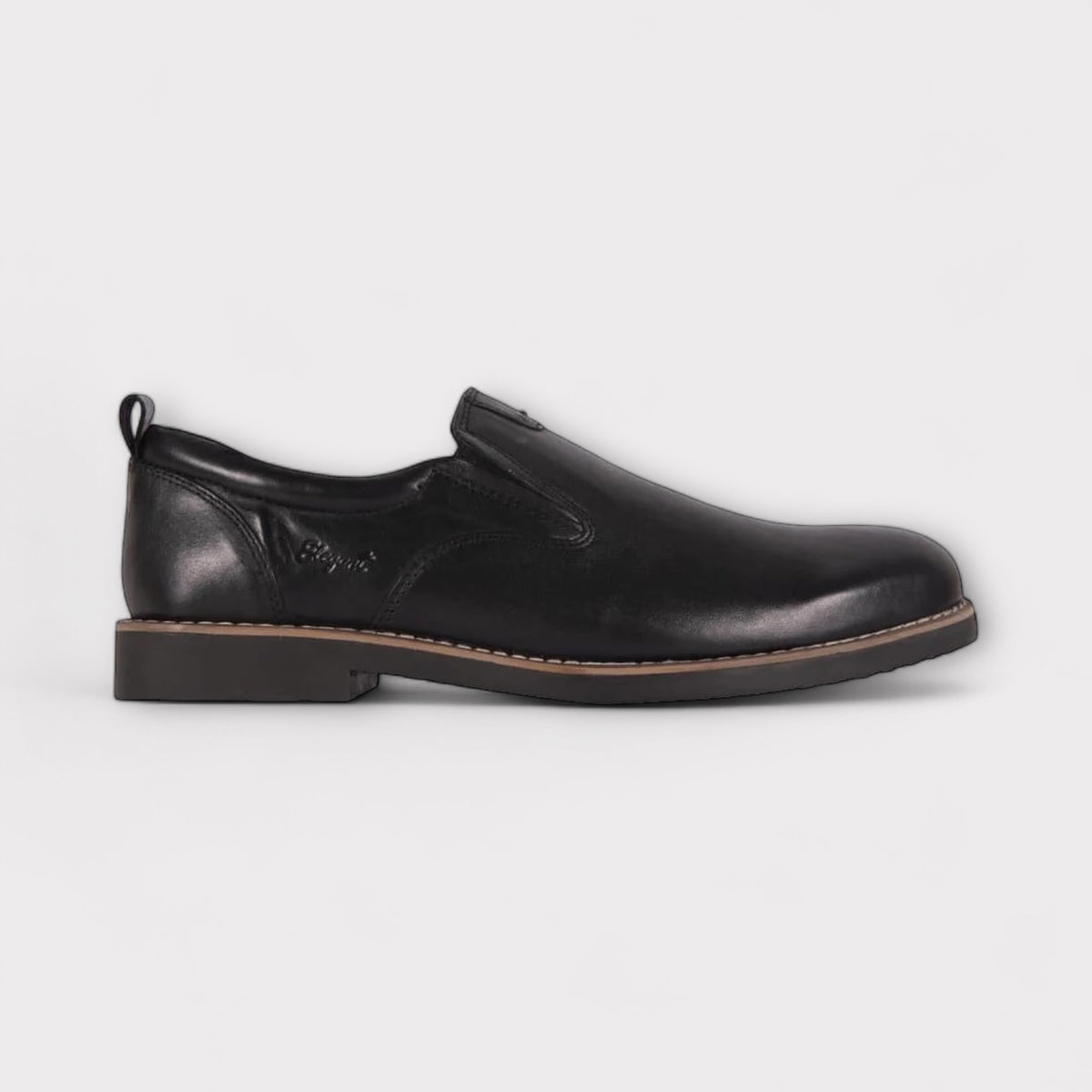 A black men's leather formal shoe with a vintage outsole detailing.