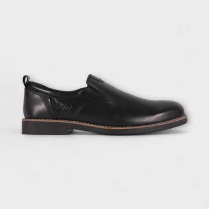 A black men's leather formal shoe with a vintage outsole detailing.